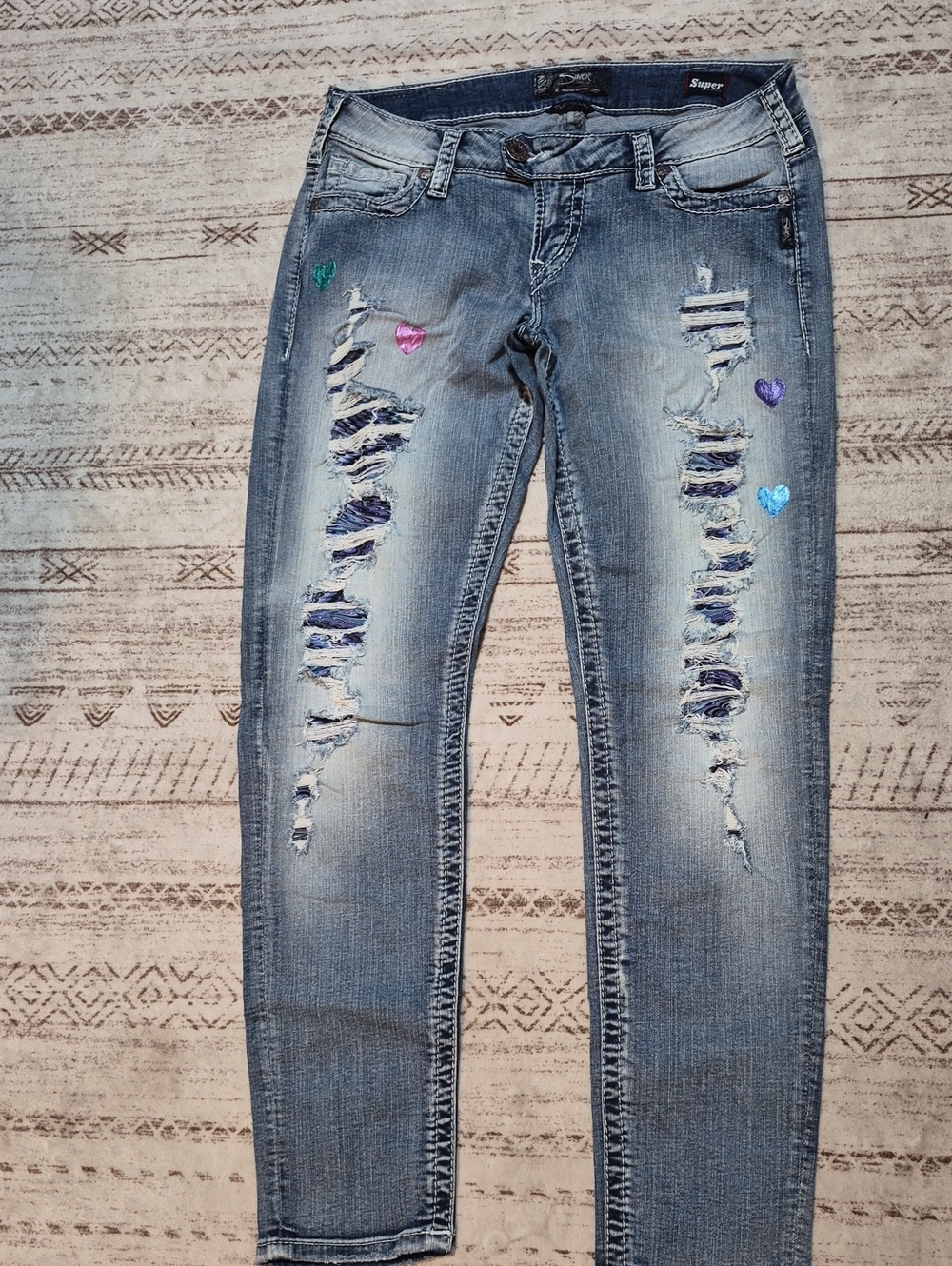 Silver Jeans Skinny Distressed Blue Denim with Multicolor Heart Patches